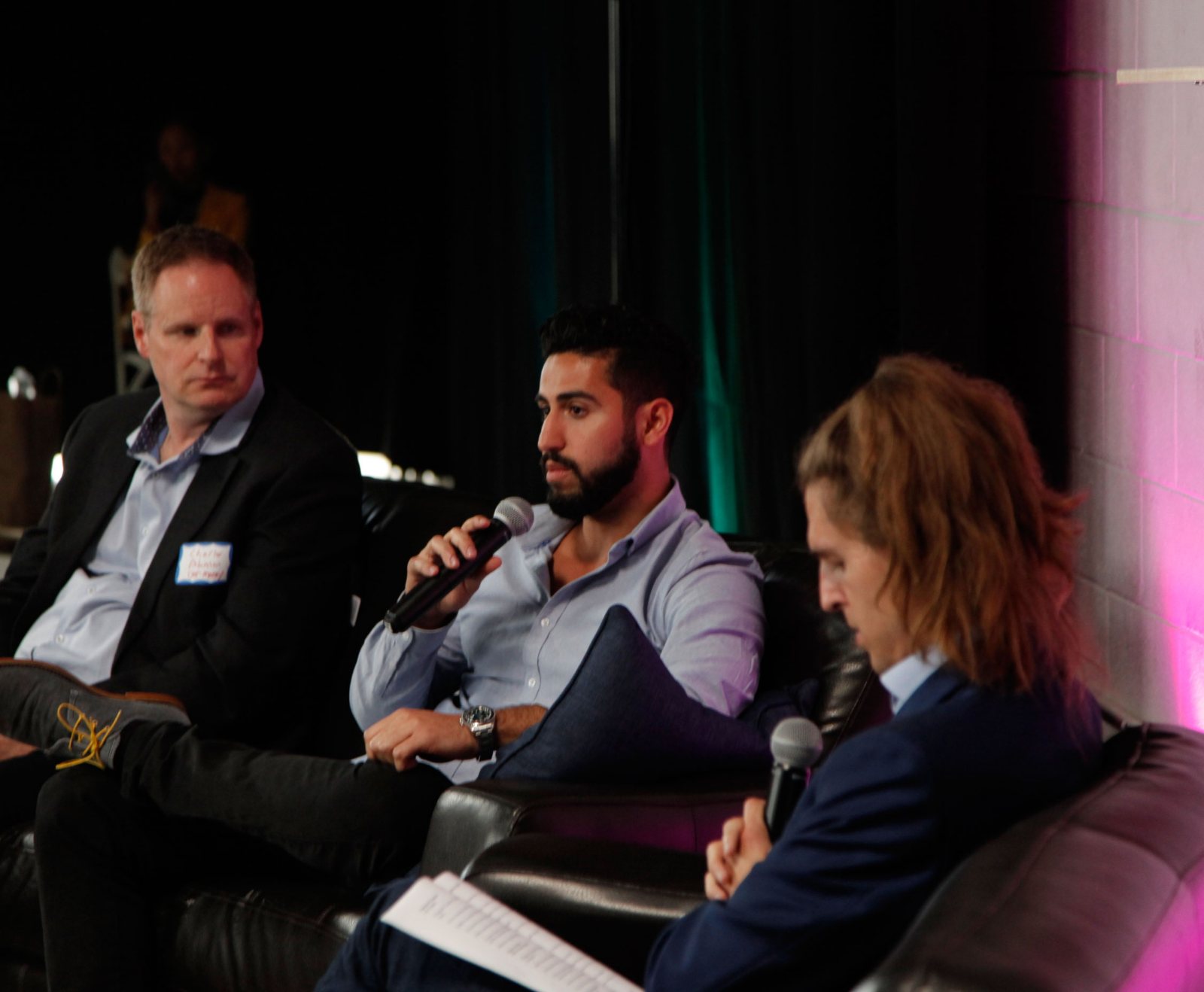 Jeremy Musighi speaking on a panel in Los Angeles